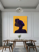 Dining room with a large abstract painting of a woman's silhouette on an orange background.